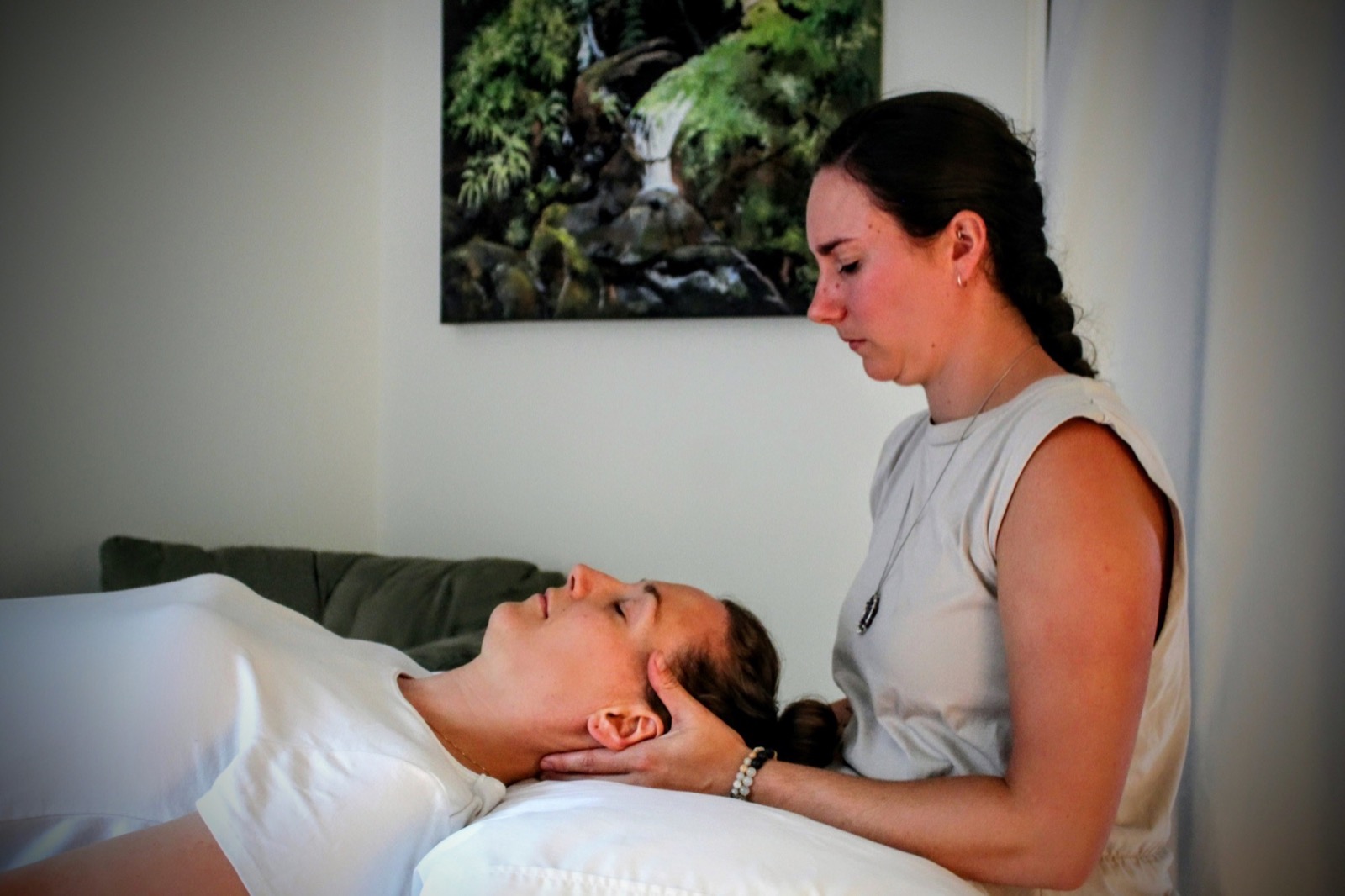 Kayla Larsen providing physiotherapy